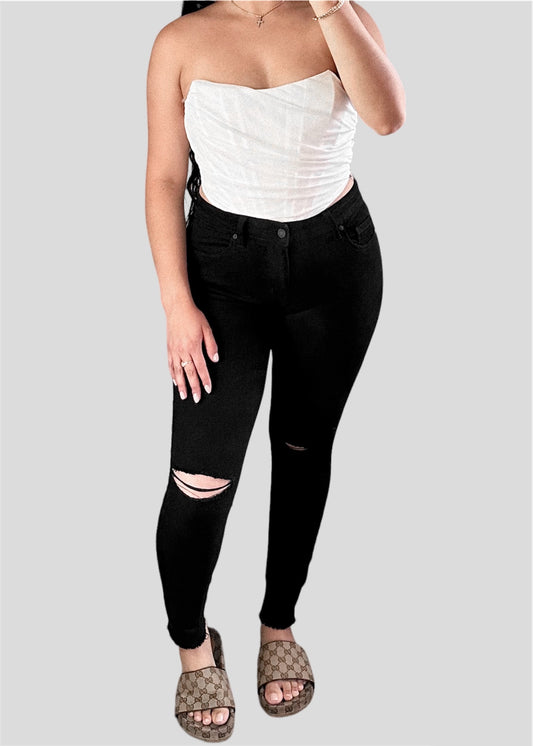 Black skinny fringe jeans